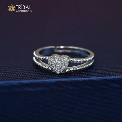 Sterling silver heart design ring with cubic zirconia stones, featuring intricate craftsmanship by TRIBAL ORNAMENTS.