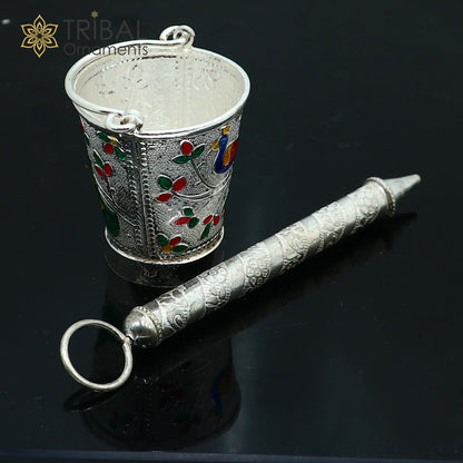 Sterling silver Pichkari and bucket accessories for Lord Krishna, trendy jewelry by TRIBAL ORNAMENTS, detailed silver craftsmanship.