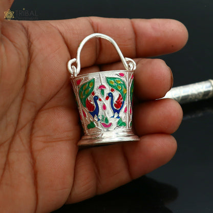 Sterling silver Pichkari and bucket accessories for Lord Krishna, trendy jewelry by TRIBAL ORNAMENTS, detailed craftsmanship image