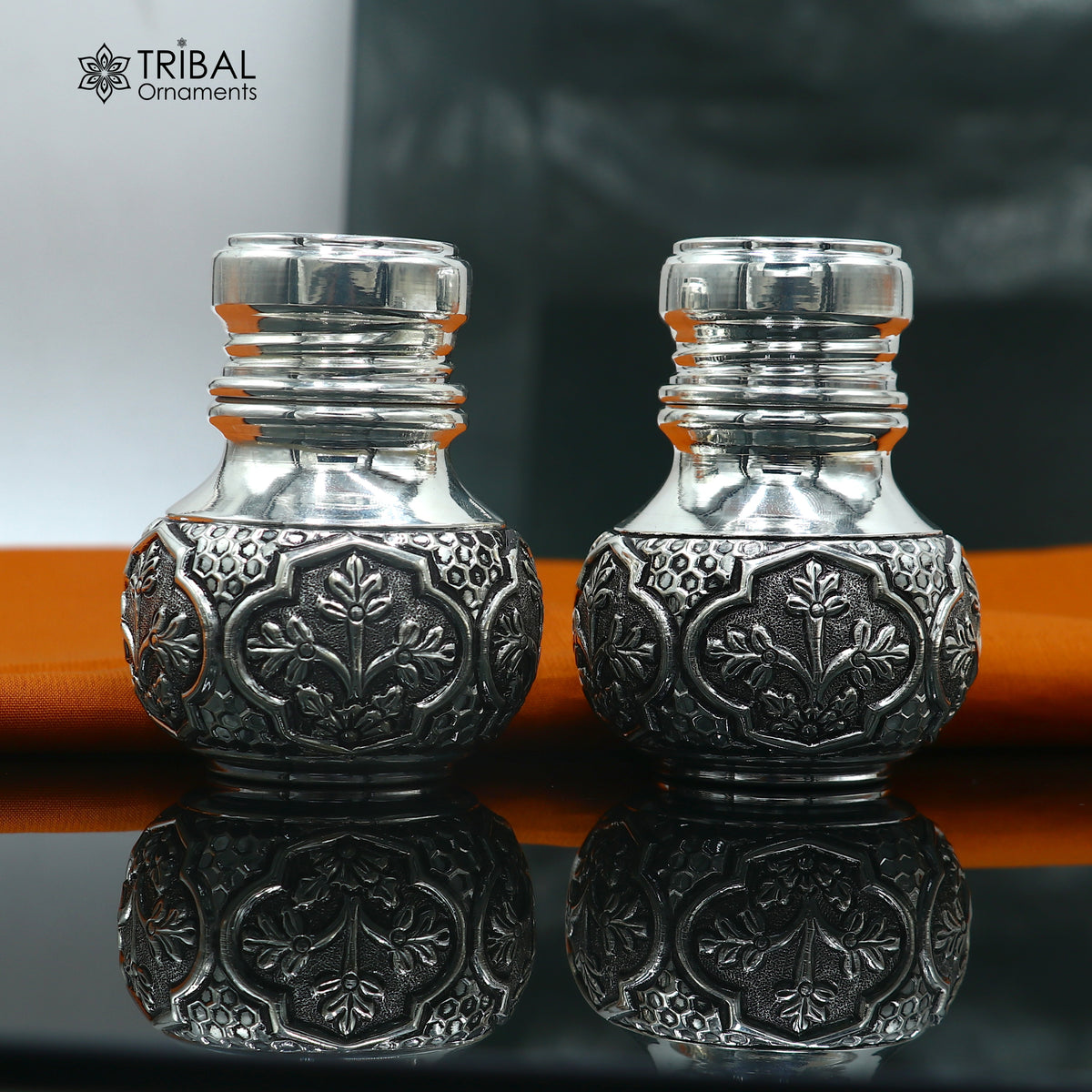 925 sterling silver Nakshi work salt and pepper shakers set by TRIBAL ORNAMENTS, featuring intricate traditional design.