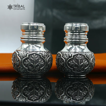 925 sterling silver Nakshi work salt and pepper shakers set by TRIBAL ORNAMENTS, featuring intricate traditional design.