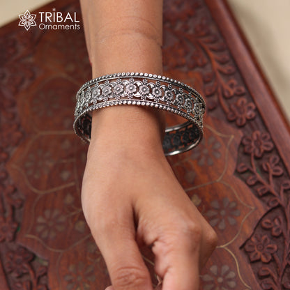 Sterling silver floral design bangle kada jewelry with intricate ethnic detailing, crafted by TRIBAL ORNAMENTS.