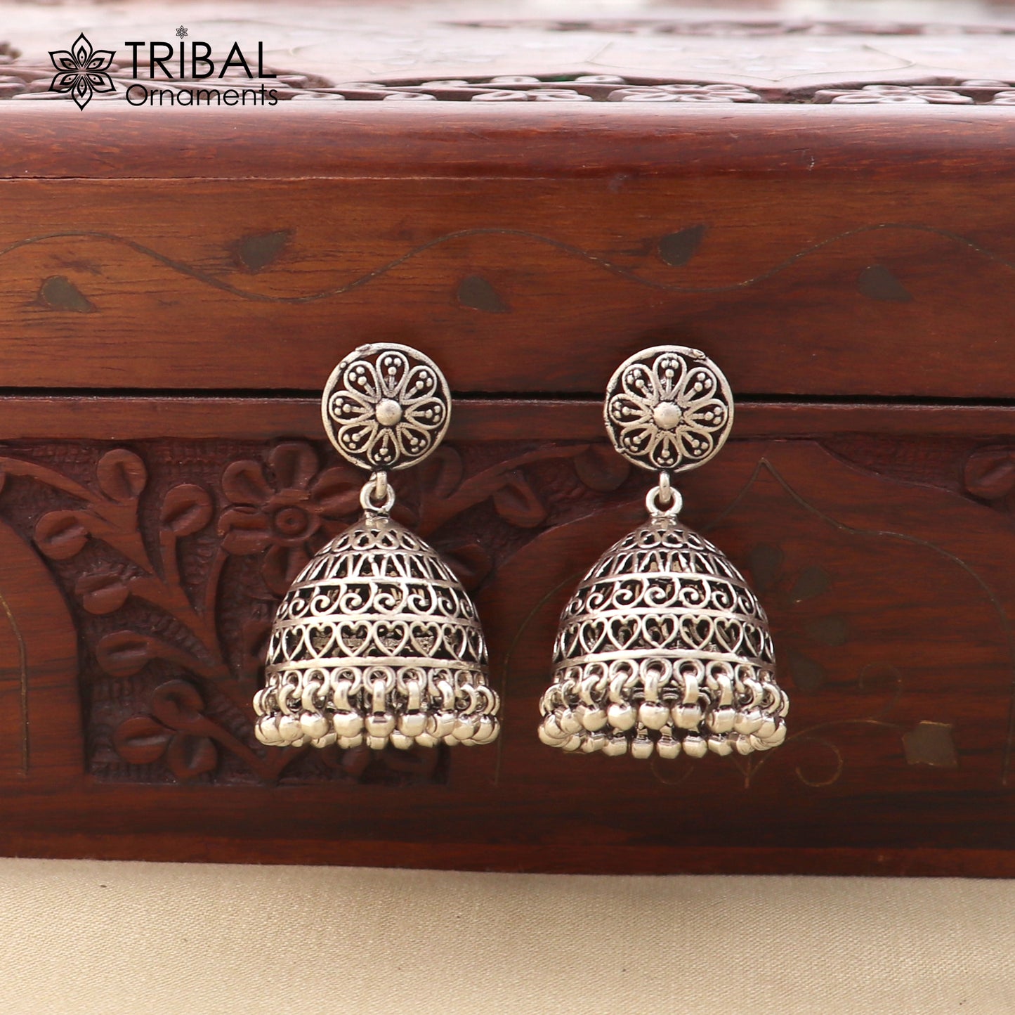 Vintage floral design 925 sterling silver jumka earring with oxidized finish, showcasing intricate craftsmanship and traditional jewelry style.