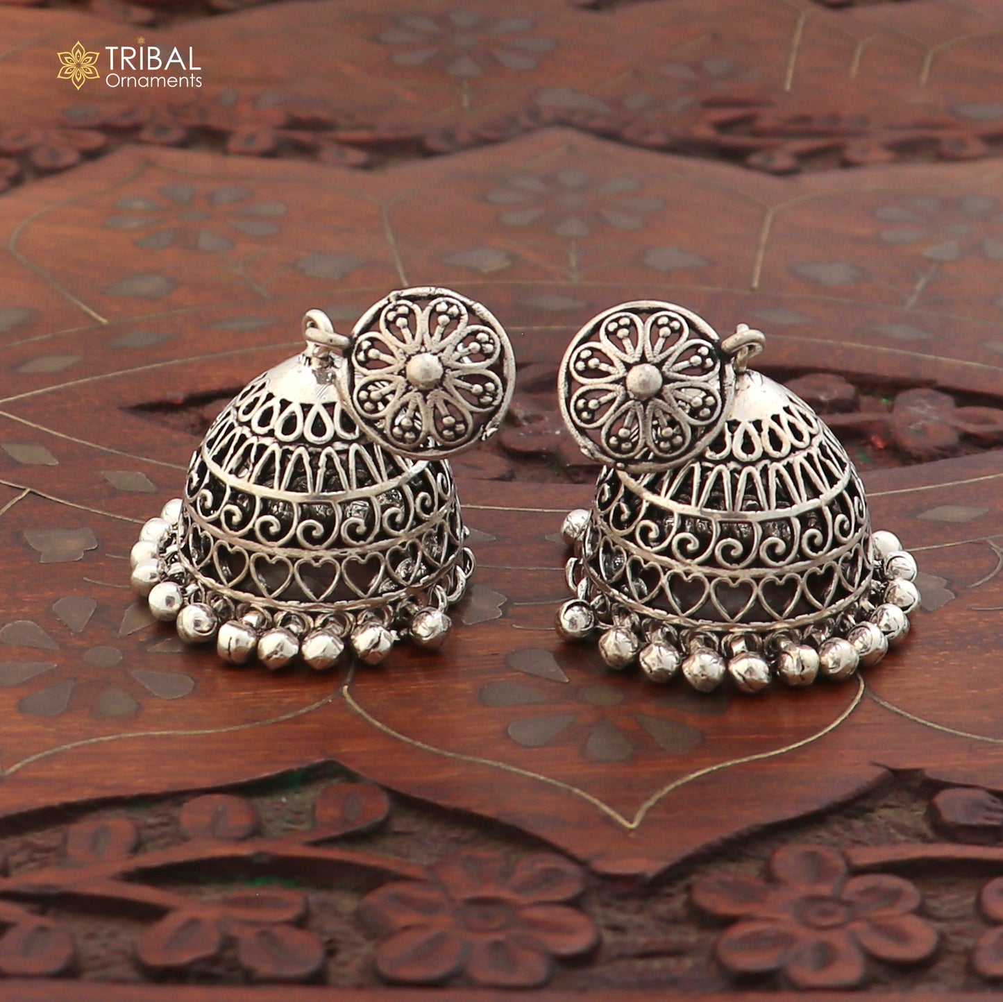 Sterling silver vintage floral jumka earring with oxidized finish, intricate design, handcrafted jewelry by TRIBAL ORNAMENTS.
