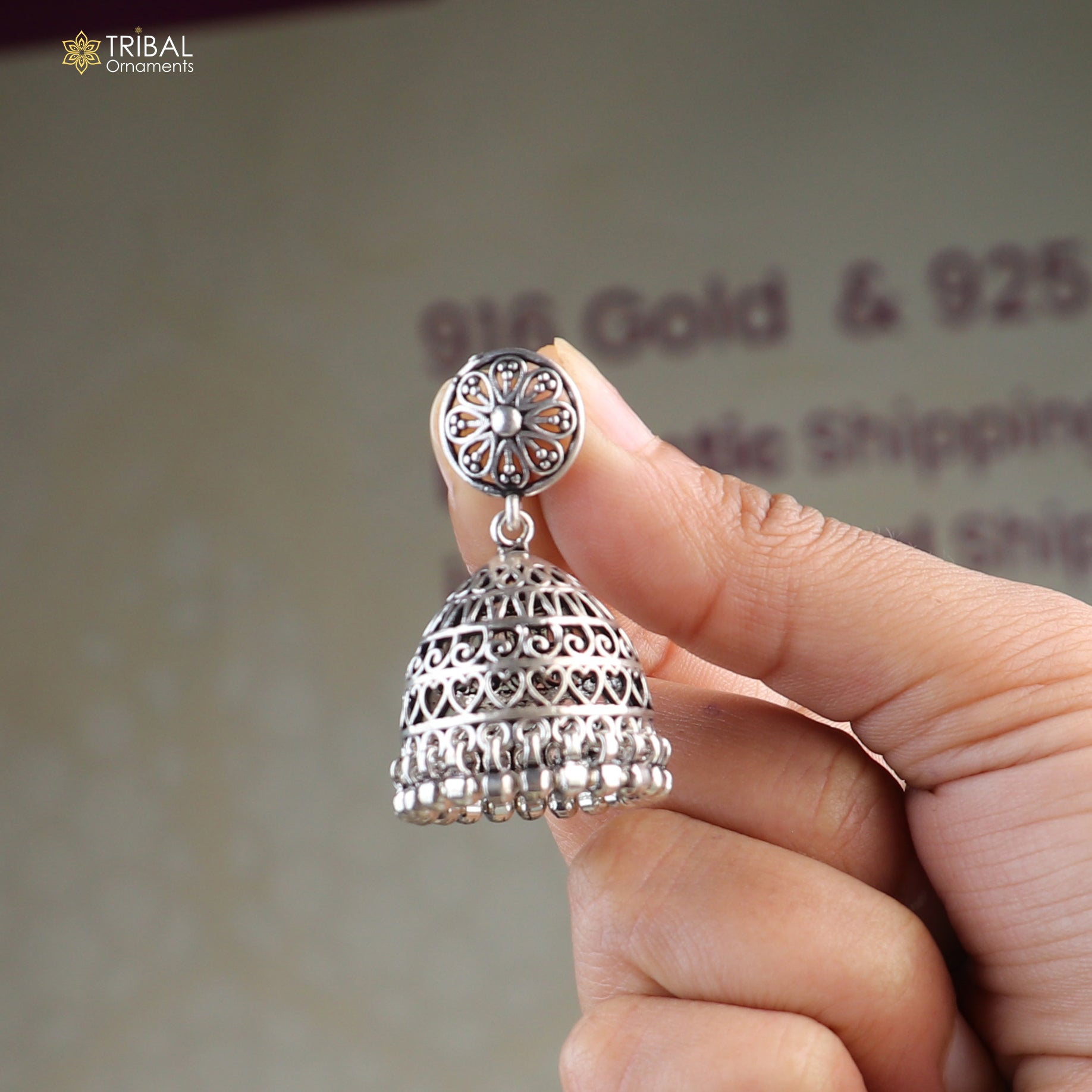 Sterling silver vintage floral jumka earring with oxidized finish and intricate design, by TRIBAL ORNAMENTS.