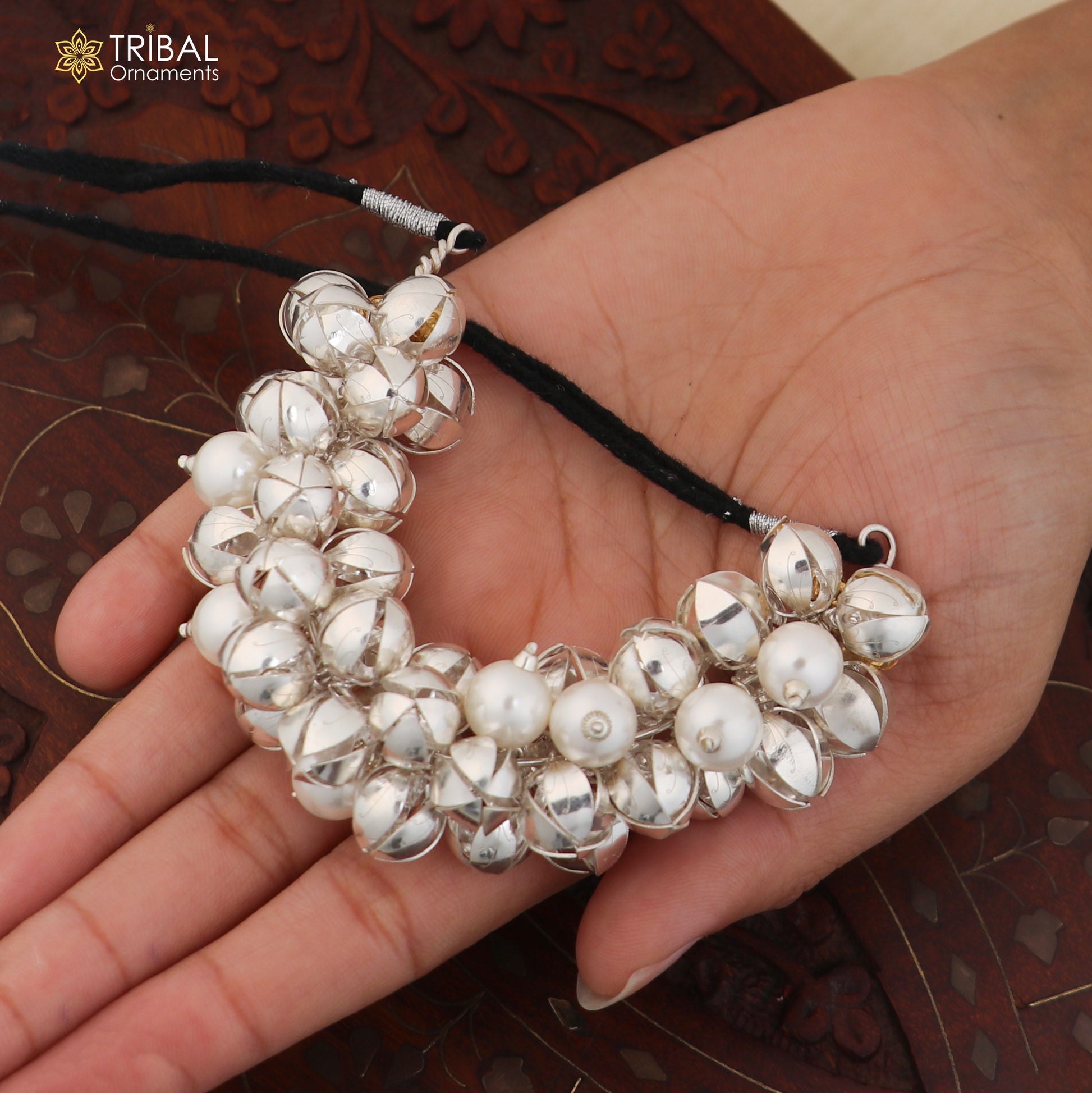 Sterling silver and pearl bead gajra hair jewelry for brides, featuring intricate tribal design and elegant craftsmanship.