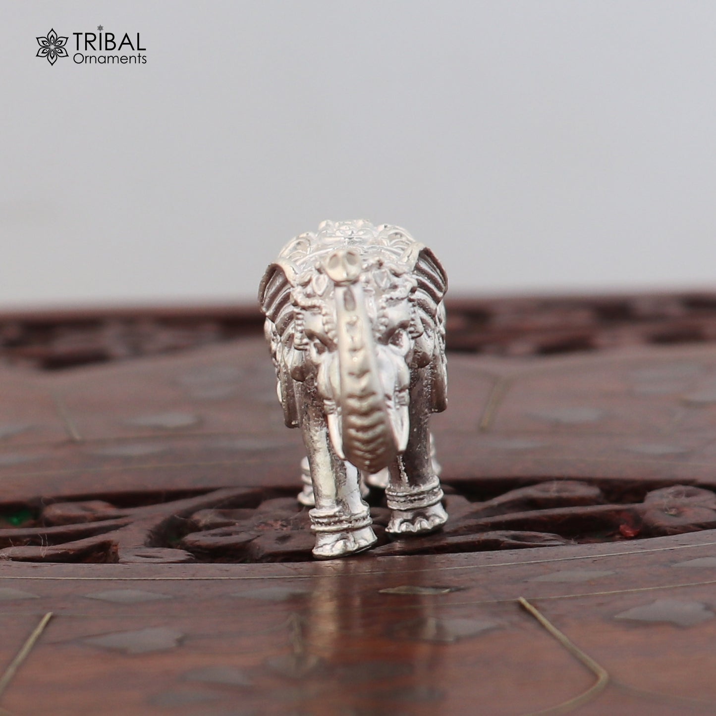 925 Sterling silver elephant sculpture figurine by TRIBAL ORNAMENTS, a puja article symbolizing wealth and prosperity.