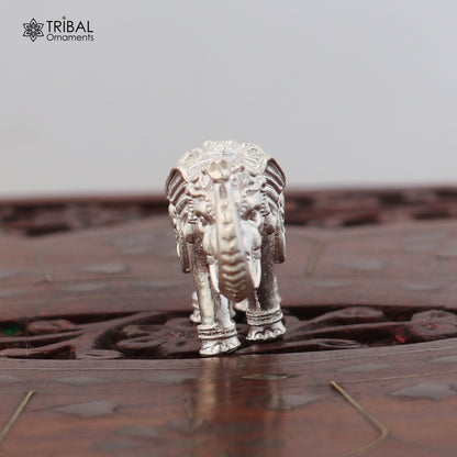 925 Sterling silver elephant sculpture figurine by TRIBAL ORNAMENTS, a puja article symbolizing wealth and prosperity.