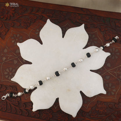 Unisex 925 sterling silver bracelet with black karungali beads, tribal-inspired jewelry by TRIBAL ORNAMENTS.