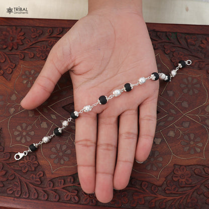 Unisex 925 sterling silver and black karungali beads bracelet with tribal design, handcrafted jewelry by TRIBAL ORNAMENTS.