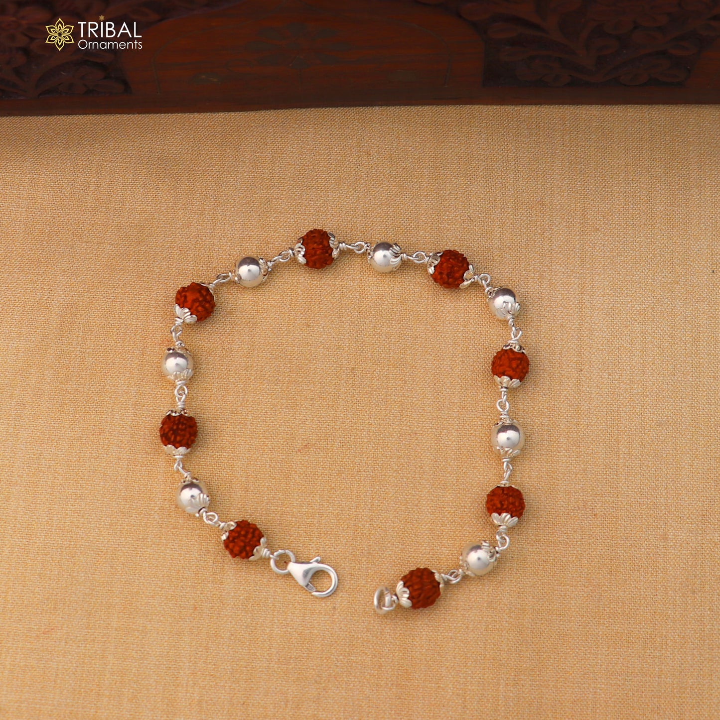 Unisex 925 sterling silver bracelet with rudraksha beads, featuring tribal-inspired jewelry design by TRIBAL ORNAMENTS.