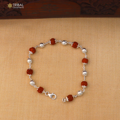Unisex 925 sterling silver bracelet with rudraksha beads, featuring tribal-inspired jewelry design by TRIBAL ORNAMENTS.