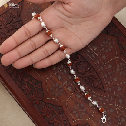 Unisex 925 sterling silver bracelet with rudraksha beads from TRIBAL ORNAMENTS, showcasing intricate bead and silver design.