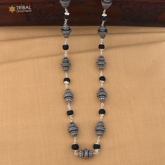Sterling silver vintage necklace with karungali beads, featuring intricate tribal design, by TRIBAL ORNAMENTS.