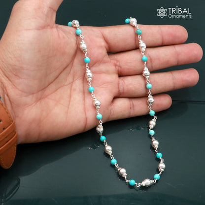 Sterling silver and turquoise beaded necklace featuring round stones, crafted by TRIBAL ORNAMENTS.