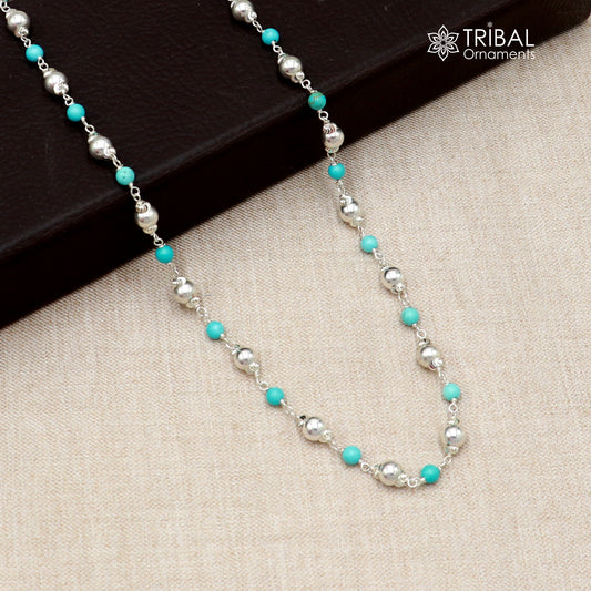 Sterling silver beaded necklace with turquoise-colored round stones, handcrafted by TRIBAL ORNAMENTS.