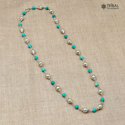 Sterling silver beaded necklace with round turquoise-colored stones, tribal-inspired jewelry by TRIBAL ORNAMENTS.
