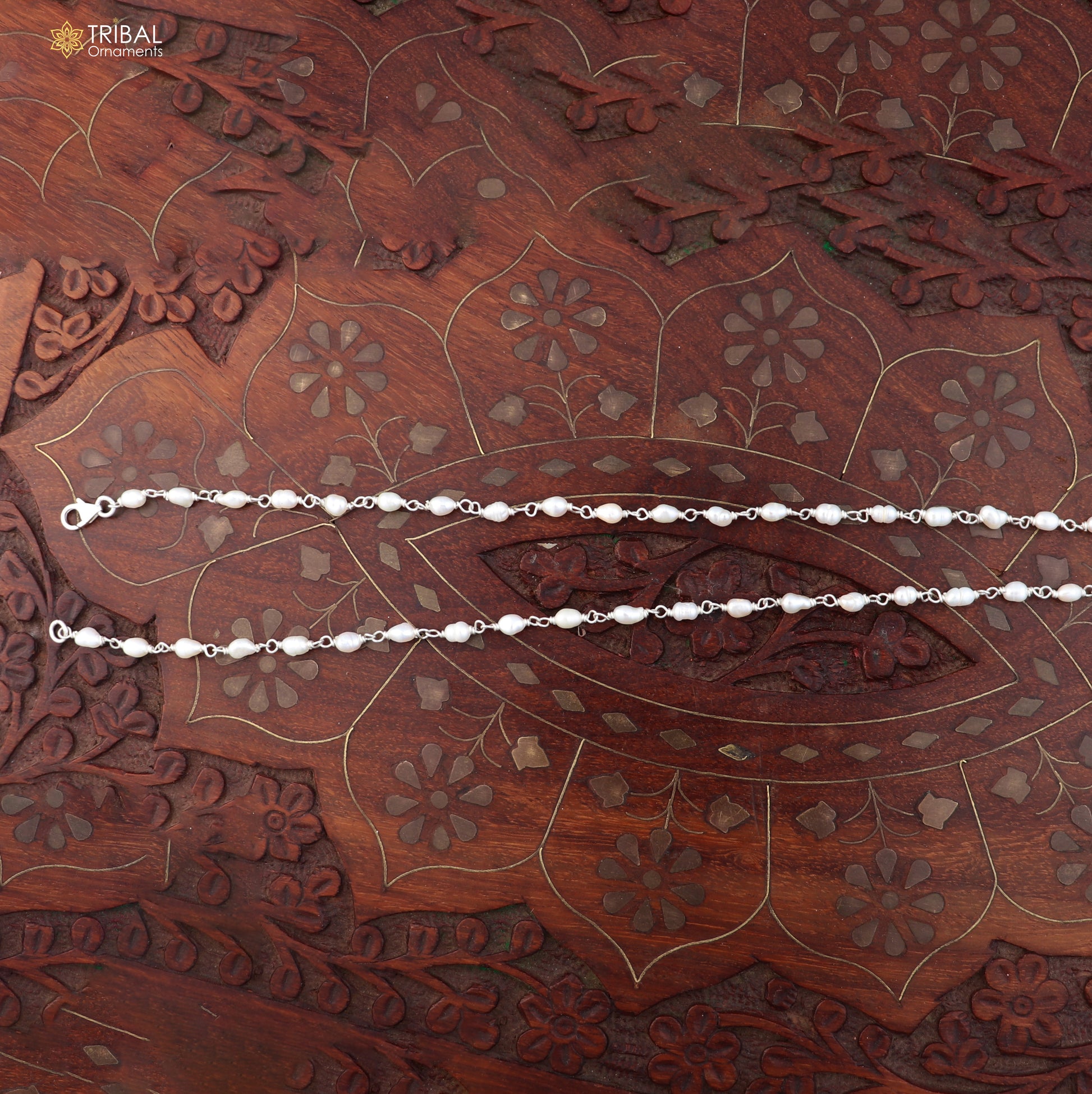 925 sterling silver pearl beads necklace by TRIBAL ORNAMENTS featuring a delicate string of lustrous white pearls.
