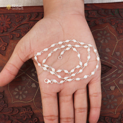 925 sterling silver pearl beads necklace by TRIBAL ORNAMENTS featuring a delicate string of lustrous pearls.