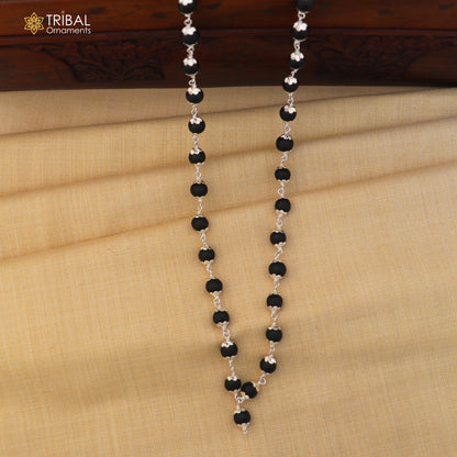 Handmade 54/108 beads Karungali round mala with 925 silver chain necklace by TRIBAL ORNAMENTS, featuring intricate beadwork and silver accents.