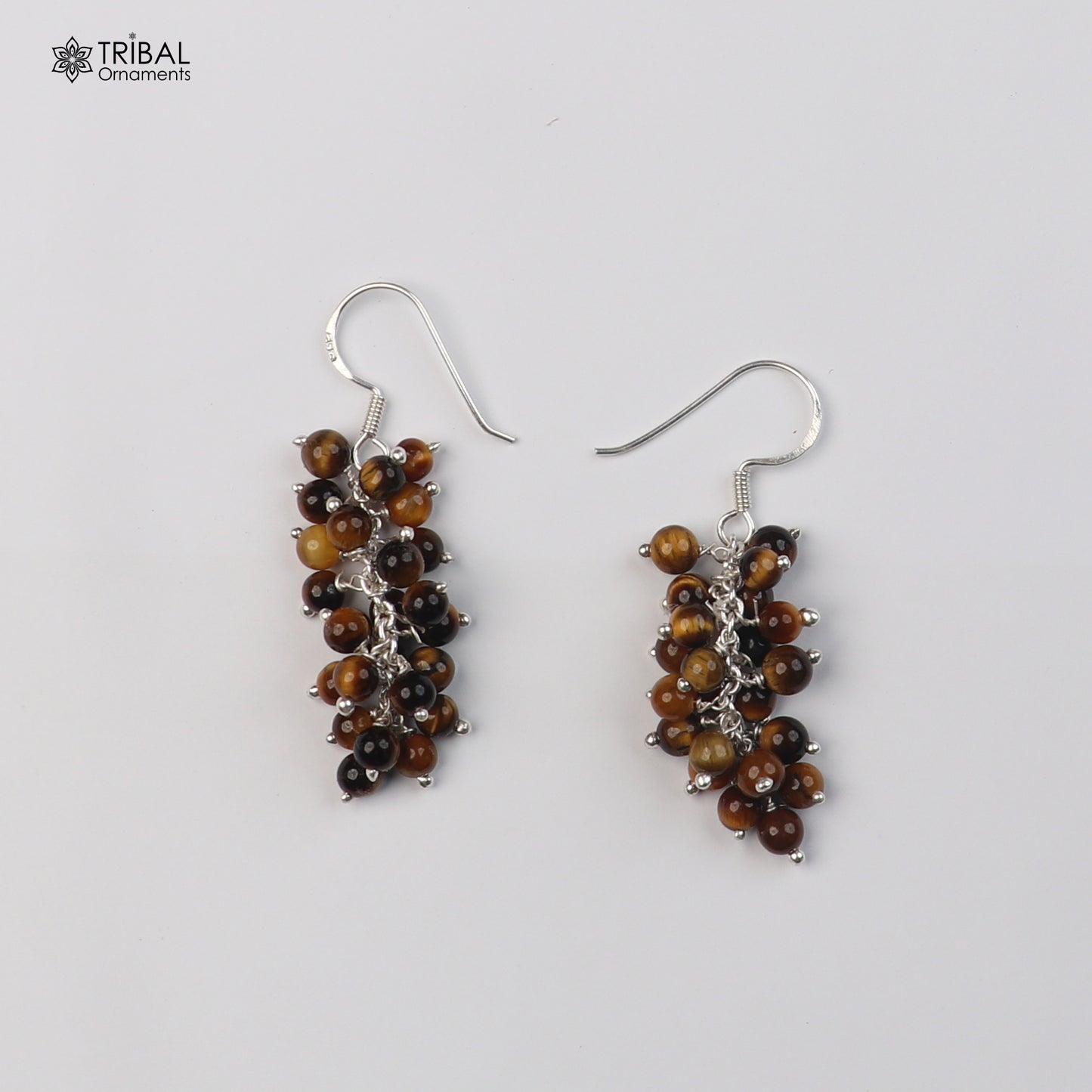 Sterling silver beaded drop dangle earring by TRIBAL ORNAMENTS, featuring intricate bead details and elegant design.