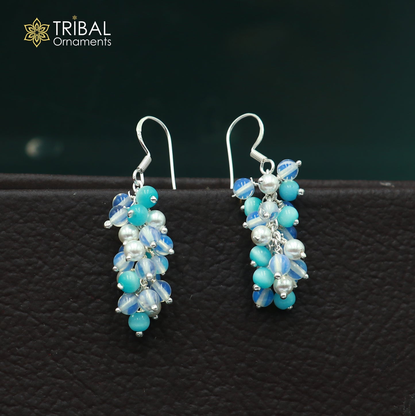 Sterling silver beaded drop dangle earring with intricate design from TRIBAL ORNAMENTS, shown hanging with detailed beadwork.