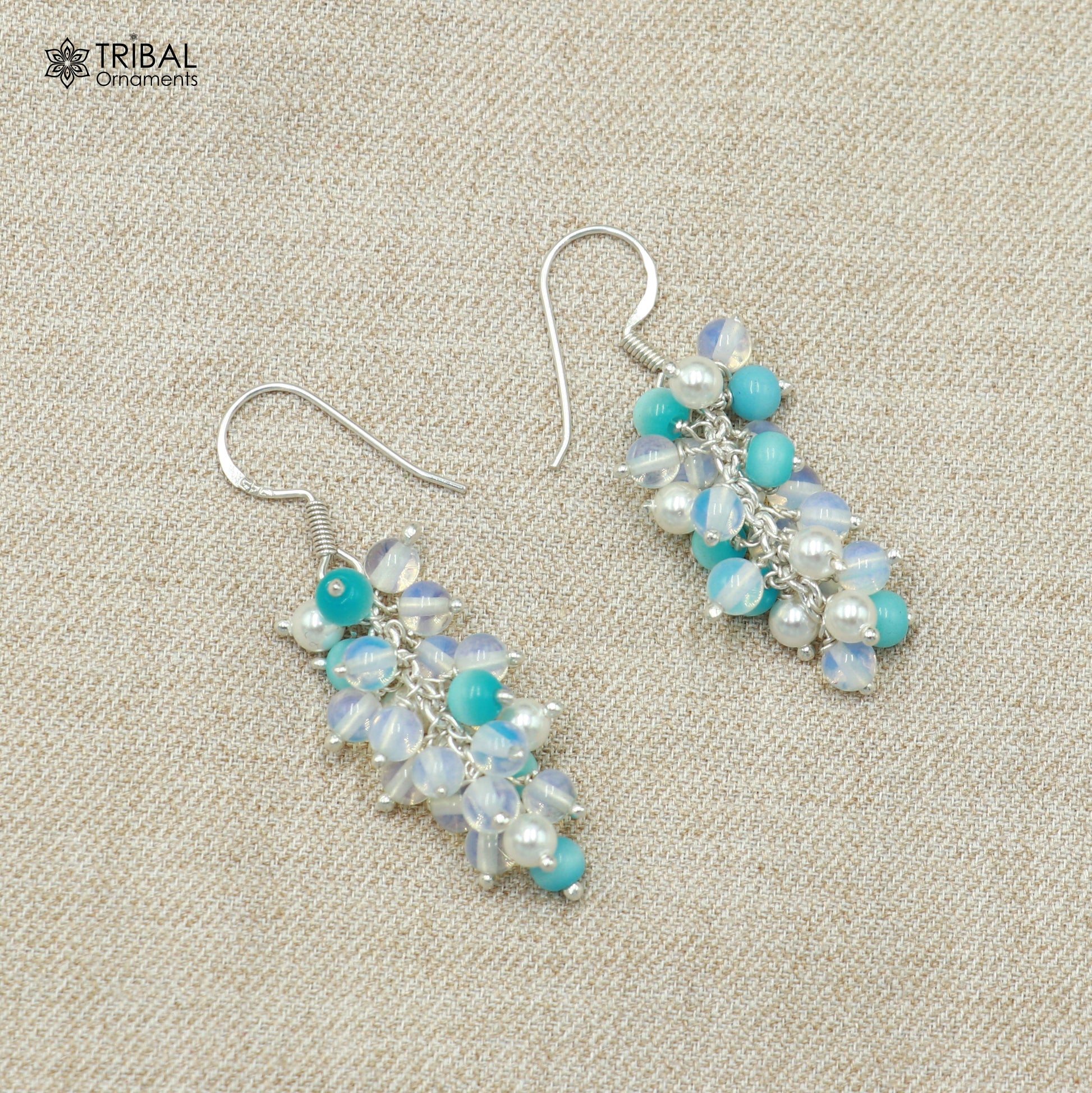 Sterling silver beaded drop dangle earring by TRIBAL ORNAMENTS, featuring intricate beaded design and elegant jewelry craftsmanship.