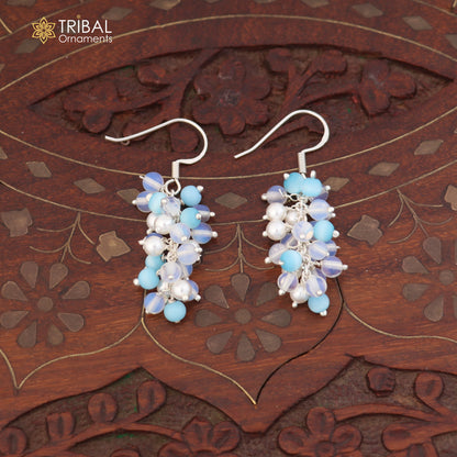 Sterling silver beaded drop dangle earring by TRIBAL ORNAMENTS, showcasing intricate beaded design and elegant length.