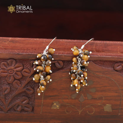 Sterling silver beaded drop dangle earring by TRIBAL ORNAMENTS with intricate bead detailing and a sleek, elegant design.