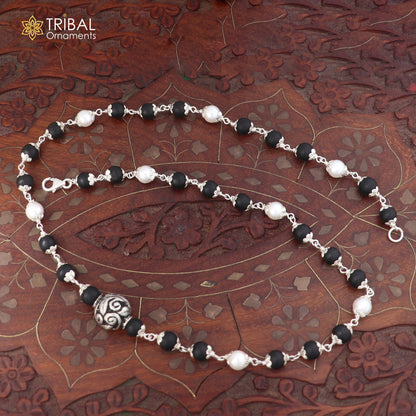Sterling silver vintage necklace with pearl and karungali beads from TRIBAL ORNAMENTS, featuring intricate traditional design.