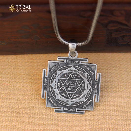 925 sterling silver Shree Laxmi Narayan yantram pendant with chain, tribal jewelry by TRIBAL ORNAMENTS, displayed on a plain background.