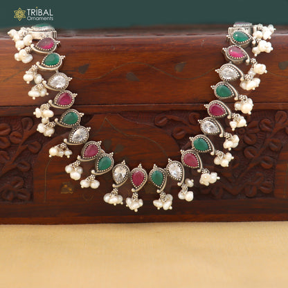 Sterling silver ethnic jewelry set with ruby red and green cut stones, includes necklace and earrings by TRIBAL ORNAMENTS