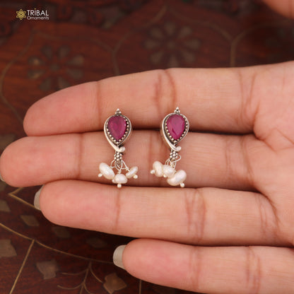 Sterling silver ethnic jewelry set with ruby red and green cut stones, includes necklace and earrings by TRIBAL ORNAMENTS.