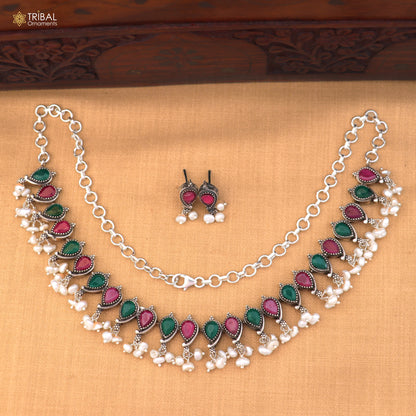 Sterling silver ruby red and white cut stone necklace and earrings set with oxidized ethnic design by TRIBAL ORNAMENTS.
