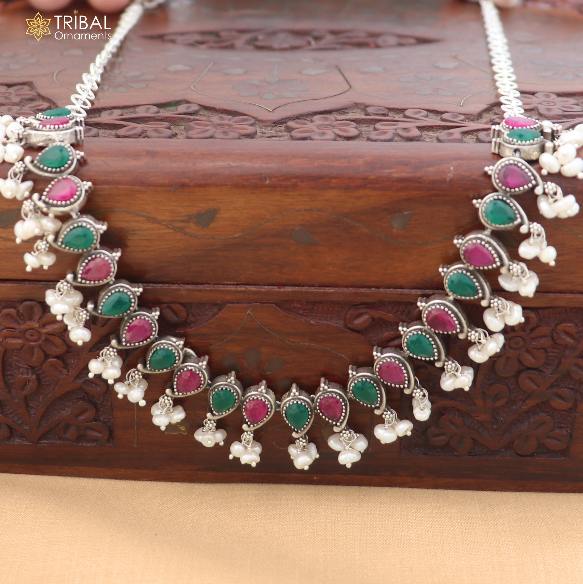Sterling silver ethnic jewelry set with ruby red and white stone necklace and earrings from TRIBAL ORNAMENTS.