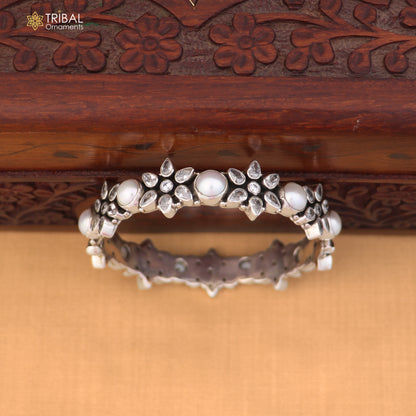 Sterling silver floral design stone bangle bracelet with ethnic jewelry style from TRIBAL ORNAMENTS.