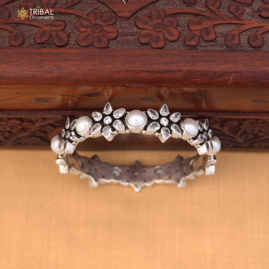 Sterling silver floral design stone bangle bracelet with ethnic jewelry style from TRIBAL ORNAMENTS.