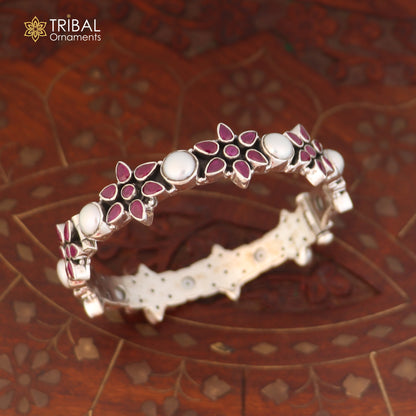 Sterling silver floral stone bangle bracelet with ethnic design, crafted by TRIBAL ORNAMENTS, showcasing intricate floral details.