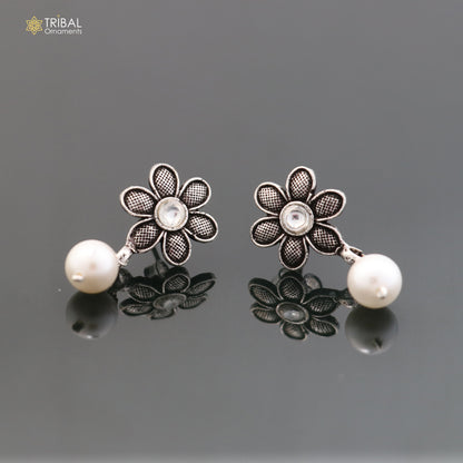 Sterling silver flower design drop earrings with stone accents, dangle style, elegant jewelry for girls by TRIBAL ORNAMENTS.