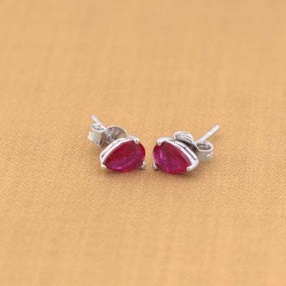 Sterling silver oval stone stud earring by Tribal Ornaments, unisex jewelry, showcasing a polished oval gemstone on a silver post.