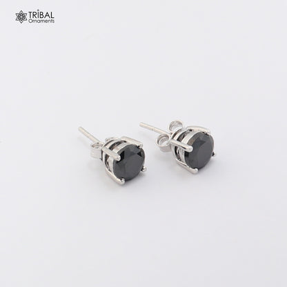Sterling silver round black stone stud earring by TRIBAL ORNAMENTS, unisex jewelry, close-up view of elegant black gemstone design.