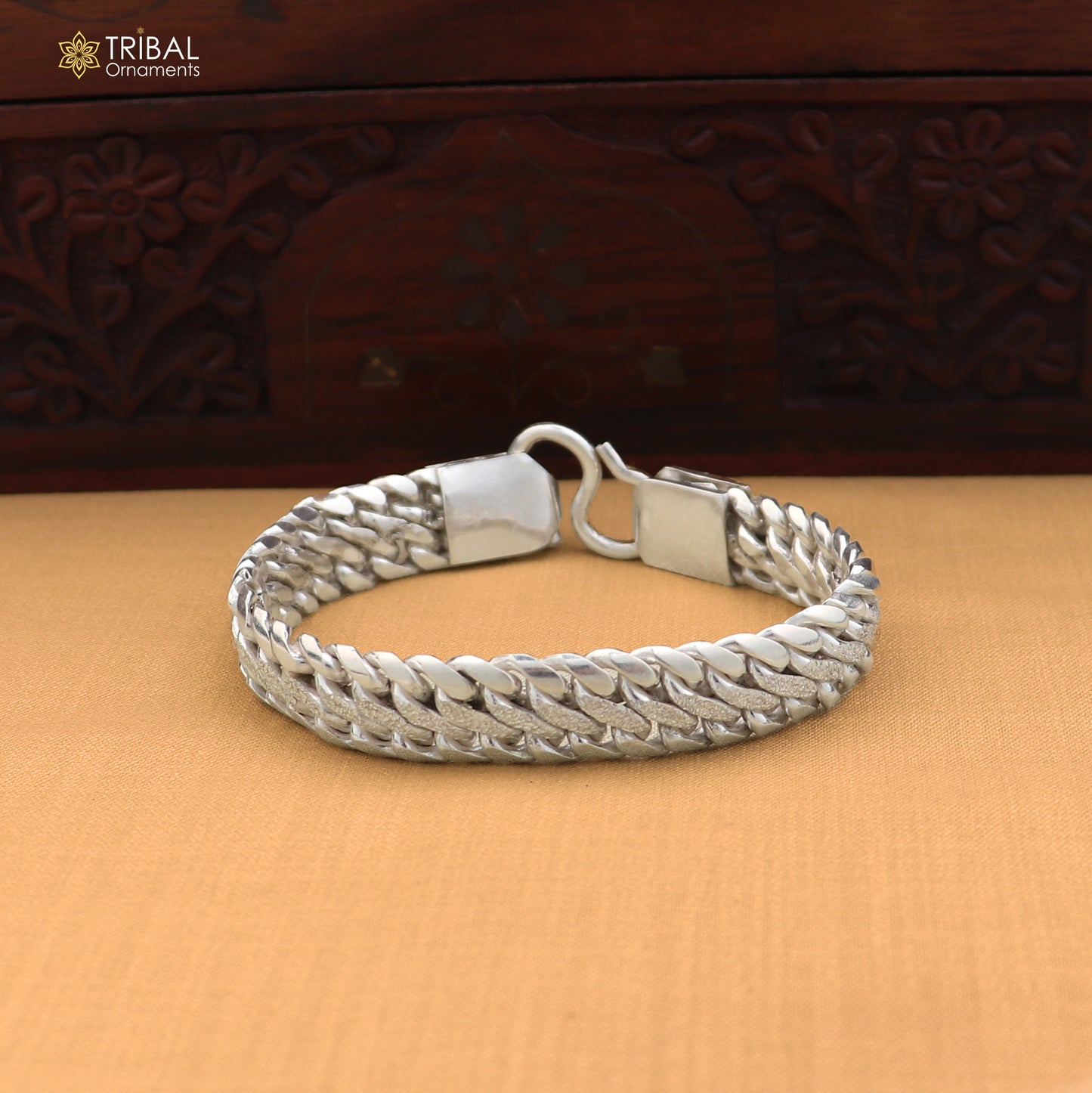 Sterling silver men's bracelet with personalized custom design by TRIBAL ORNAMENTS, heavy royal jewelry style.