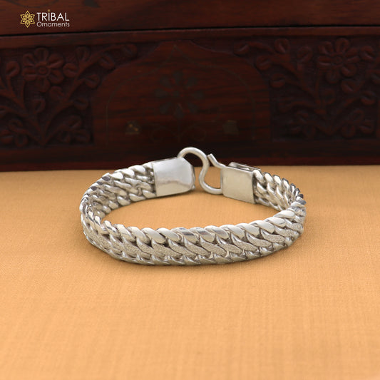 Sterling silver men's bracelet with personalized custom design by TRIBAL ORNAMENTS, heavy royal jewelry style.