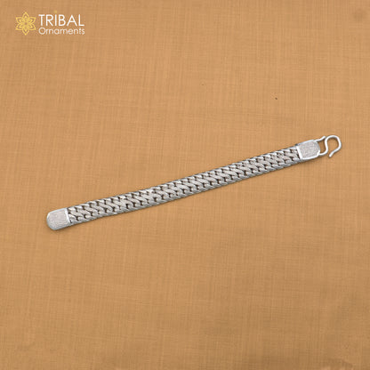 Sterling silver men's bracelet with customized design from TRIBAL ORNAMENTS, featuring personalized royal jewelry style.