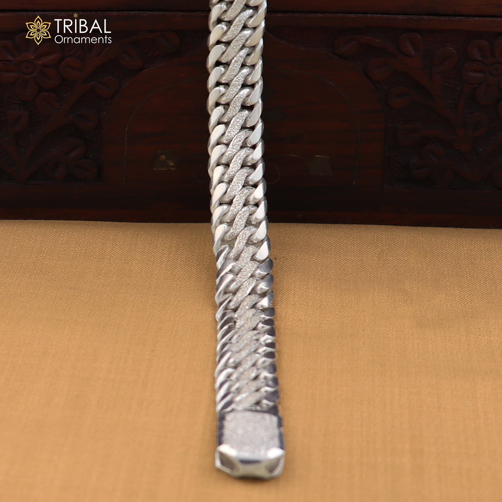 Sterling silver men's bracelet with custom design, featuring bold, personalized royal jewelry style by TRIBAL ORNAMENTS.