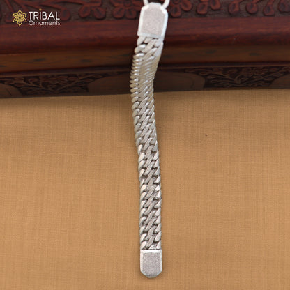 Sterling silver men's bracelet with custom design, heavy, personalized royal jewelry by TRIBAL ORNAMENTS, close-up view.