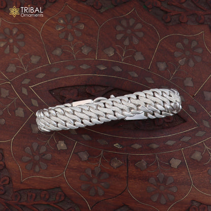 Sterling silver men's bracelet with custom design from TRIBAL ORNAMENTS, featuring personalized royal jewelry style.