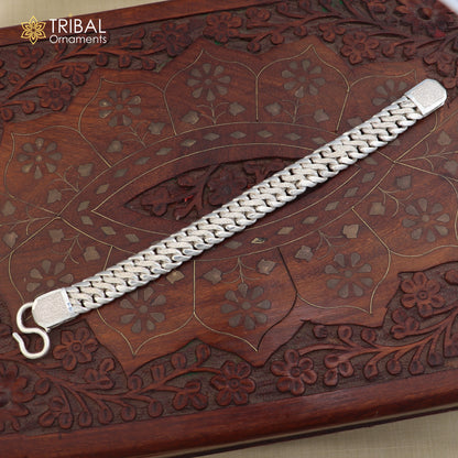 Sterling silver men's bracelet with custom design, featuring personalized royal jewelry details and intricate craftsmanship.