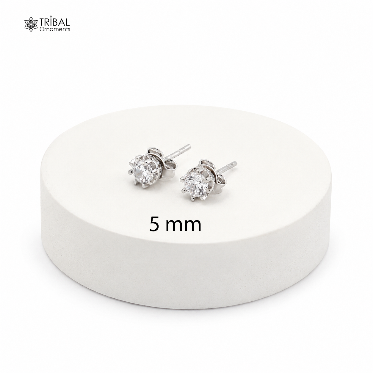 Sterling silver white diamond stud earring with round shape, unisex jewelry from TRIBAL ORNAMENTS, image showing front view of the earring.