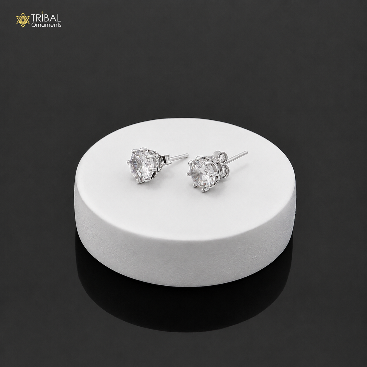 925 sterling silver white diamond stud earring with round shape, unisex jewelry by TRIBAL ORNAMENTS, close-up view.